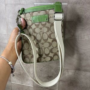 Coach Signature Crossbody Bag featuring
